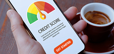 reviewing credit score on a mobile phone
