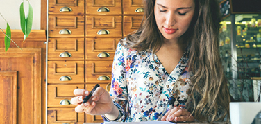 Woman reviewing worksheet