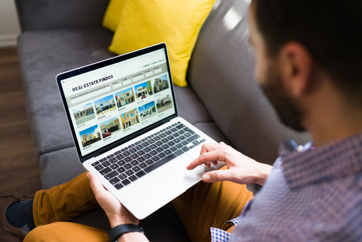 Man looking at screen of laptop